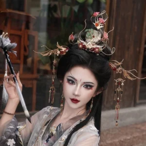 Complete Crane Shadow Hanfu hair accessories set styled on a traditional Chinese costume model with gilt crown, floral hairpins, long tassels, and matching drop earrings
