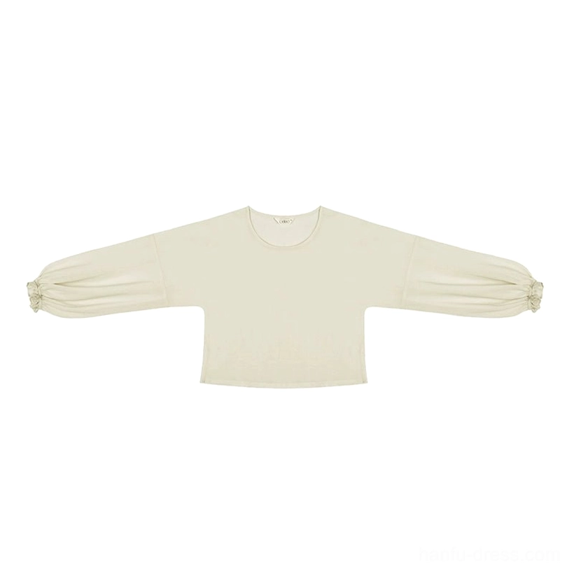 Flat lay of cream long sleeve Hanfu inner top with round neck cropped fit and elastic lantern cuffs