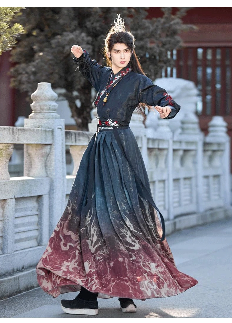 Side view of Crimson Flame unisex cross-collar hanfu outfit showing the flame-printed gradient wrap skirt, matching waist sash, and flowing ancient Chinese silhouette