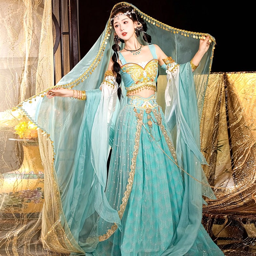 Three-quarter side view of a cyan blue and gold Dunhuang Feitian Tang Dynasty dance costume with flowing fabric, veil, and printed skirt patterns