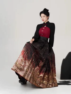 Dansha modern Ming Dynasty Hanfu mamianqun outfit in black and wine red with gilded gradient skirt, modeled in a seated studio pose