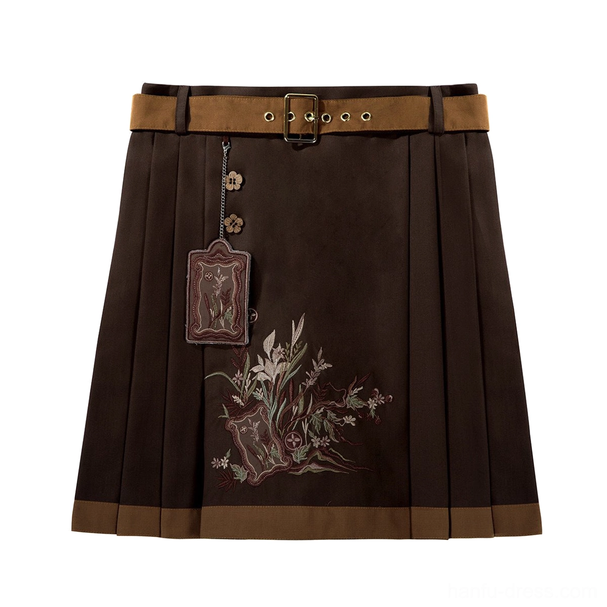 Flat lay of a dark brown pleated mamianqun horse face skirt with matching waist belt, botanical embroidery, and hanging leather-look decorative pendants