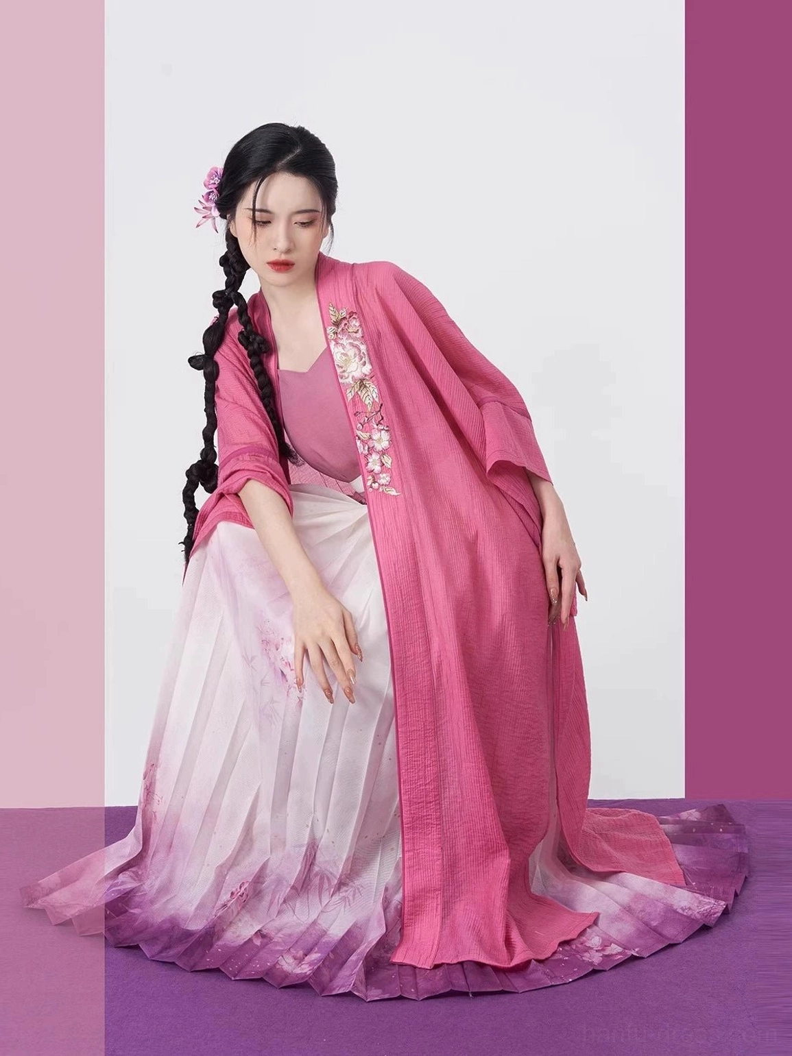 Dark rose pink Song Dynasty hanfu full set shown in a seated pose with floor-length beizi and trailing gradient skirt hem