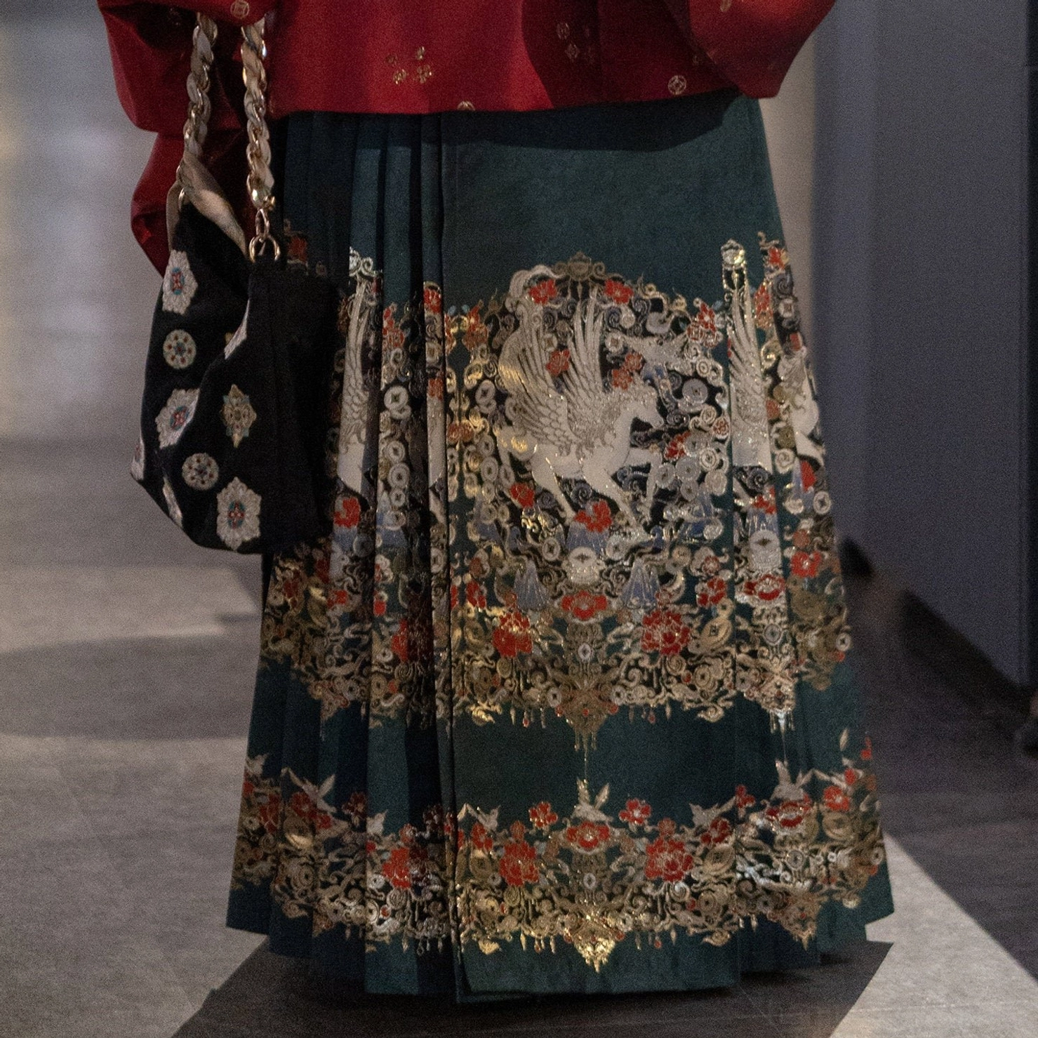 Dark teal Ming-inspired mamian skirt with silver winged horse embroidery and gold floral border