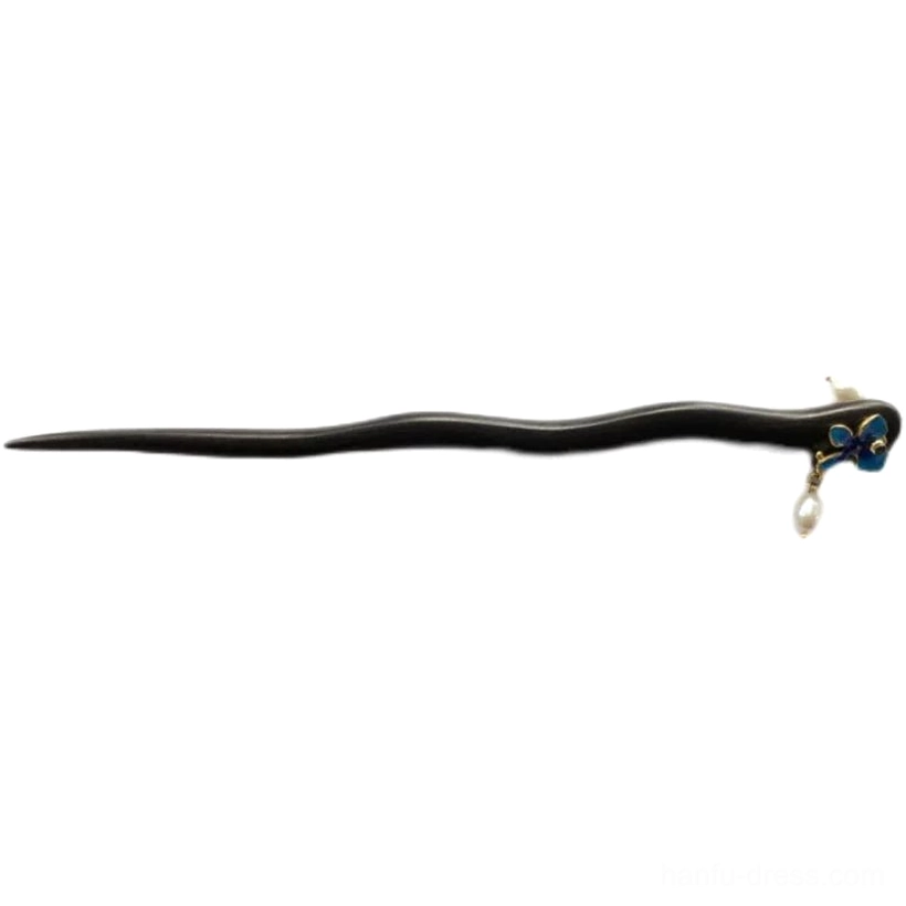 Full length view of dark wavy sandalwood Chinese hair stick with blue enamel flower accent and pearl drop pendant