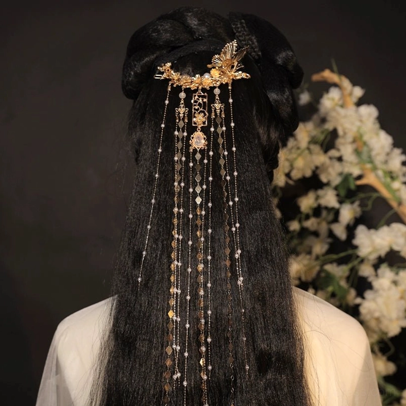 Dazzle gold butterfly pearl tassel Chinese bridal hairpin worn at the back of an elegant Hanfu hairstyle