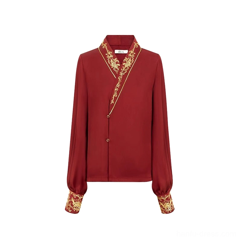 Flat lay view of a deep red cross-collar Hanfu inner top with golden collar and cuff embroidery and front button closure