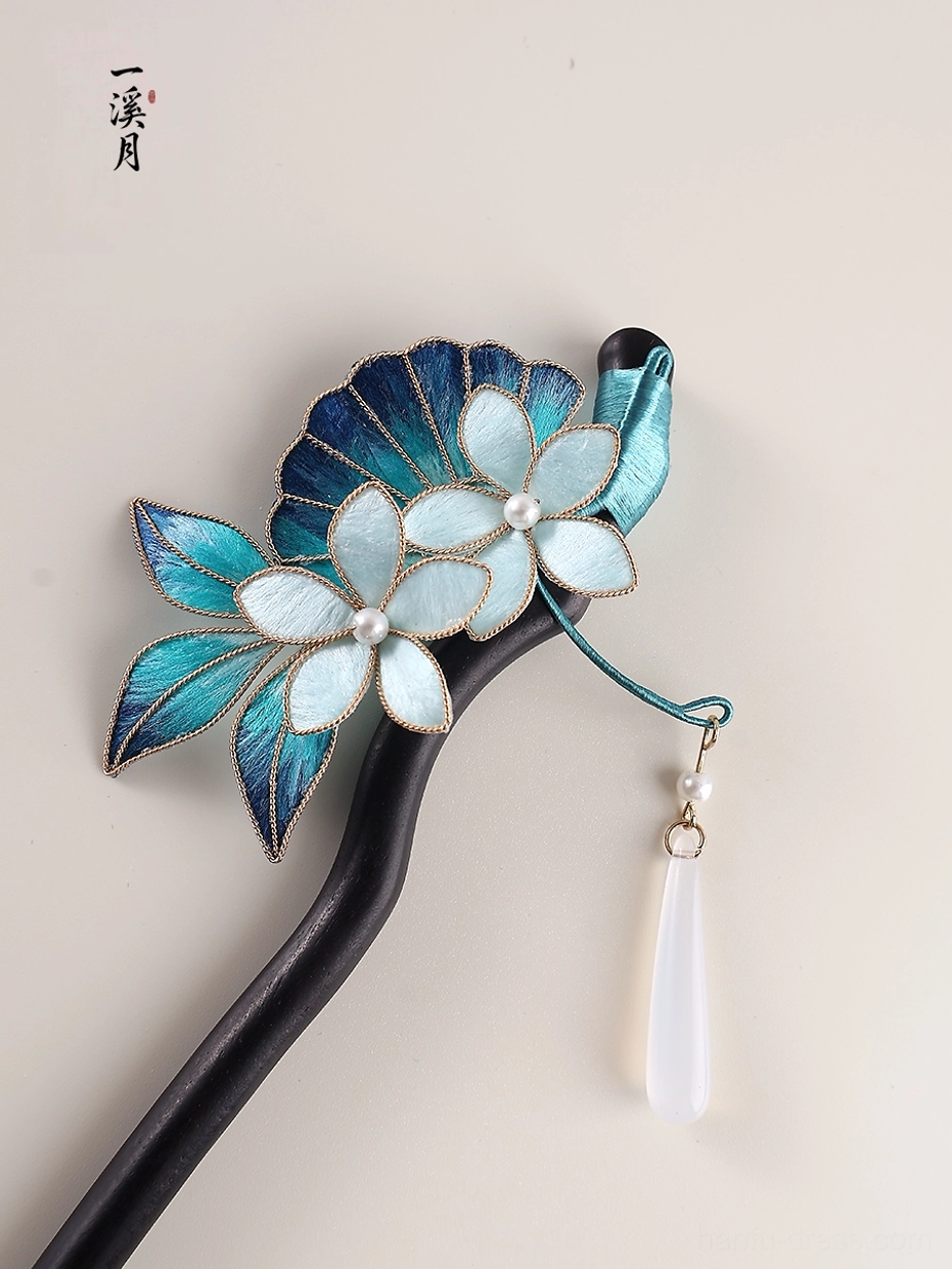 Antique-inspired blue floral Chinese hairpin with layered petals pearl accents dark wood base and dangling teardrop pendant