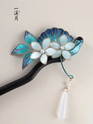 Deep sea blue floral Chinese hair stick with dark wooden pin pearl flower centers gold wire trim and white teardrop tassel