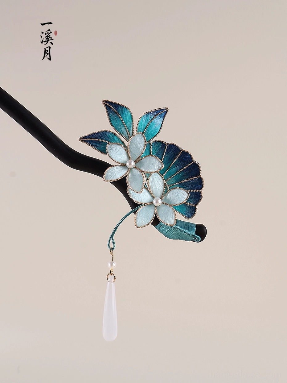 Side view of blue flower Chinese hair stick for Hanfu with streamlined black wooden pin and white teardrop pendant