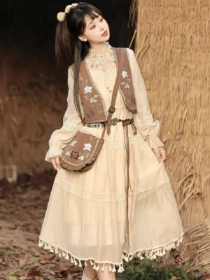 Complete Desert Whisper Modern Hanfu outfit with embroidered brown vest, beige lace trimmed midi dress, and coin tassel crossbody bag