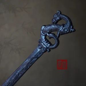 Dragon carved Chinese hair stick in dark wood finish displayed on a vintage bamboo leaf background for Hanfu and wuxia swordsman hairstyles