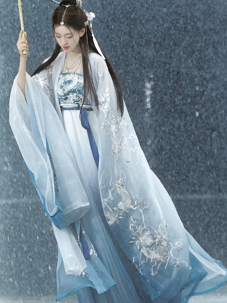 Dragon Queen Tang style Hanfu dress set with silver dragon-inspired embroidery, blue gradient heziqun skirt, and wide sleeve outer coat