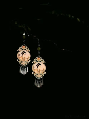 Dream of Red Mansions maiden tassel Chinese earrings hanging on a twig with jade green bead accents and antique portrait pendants