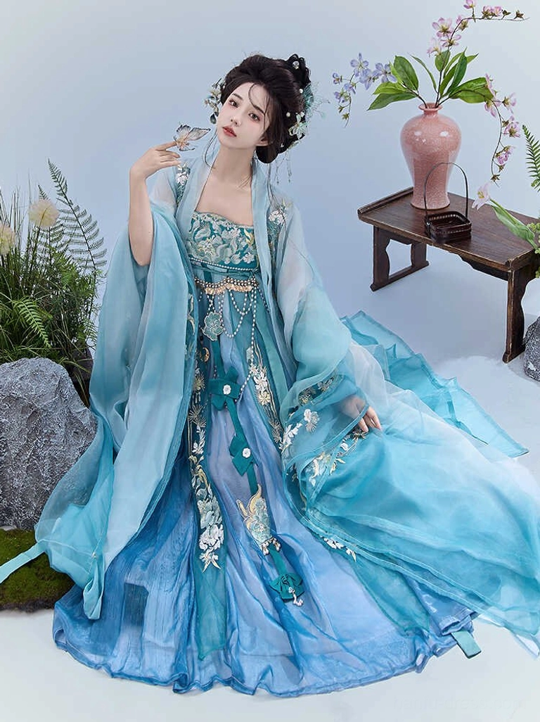 Blue gradient Tang Dynasty Heziqun Hanfu complete set with gold floral embroidery and long trailing hem seated view