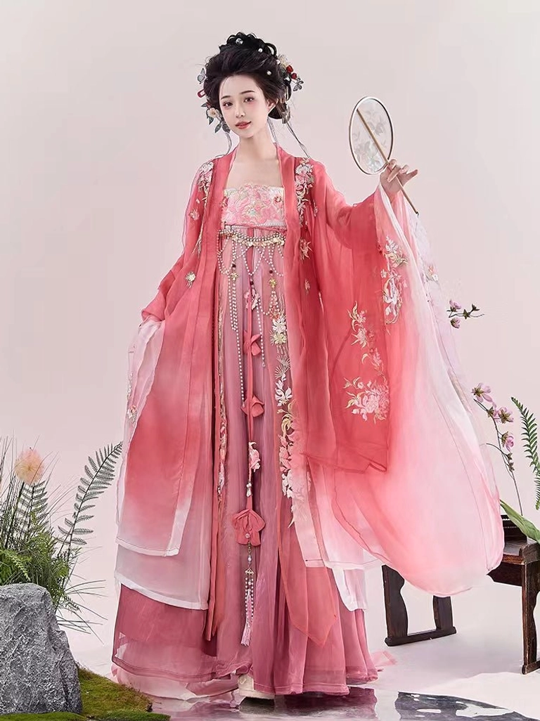 Pink gradient Tang Dynasty Heziqun Hanfu dress with floral embroidery, wide chiffon-look sleeves, and round silk fan