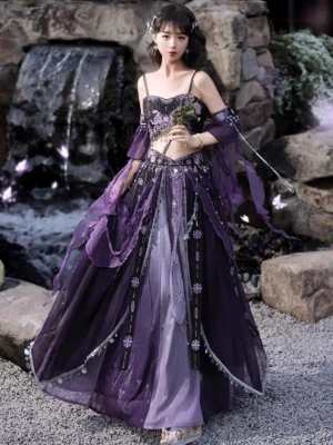 Front view of a Dunhuang Feitian Hanfu costume with layered purple chiffon skirt, silver floral embroidery, detached sleeves, and matching sheer cape