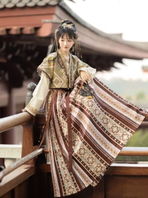 Side view of a Dunhuang Feitian style Hanfu costume with a retro printed cropped top, striped pleated long skirt, traditional tassel hair accessories, and layered modern Chinese styling