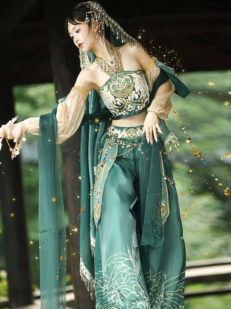 Three-quarter side view of a Dunhuang Feitian Hanfu dance costume featuring an exposed midriff, flowing green silk scarves, embroidered waist belt, and hanging tassels