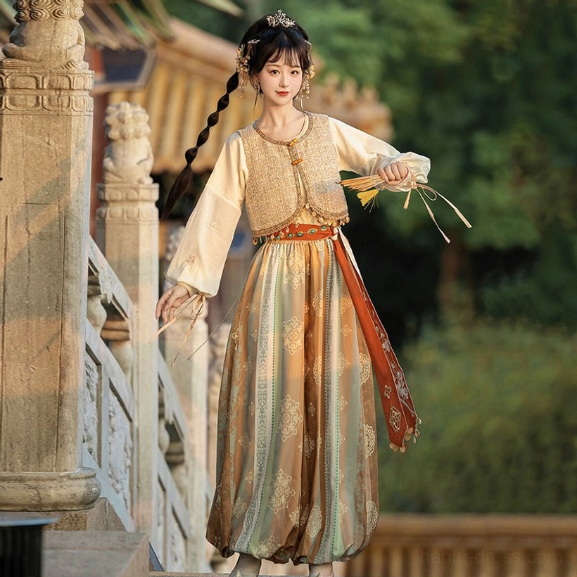 Dunhuang Feitian Tang Dynasty Hanfu complete set side view featuring lantern sleeve top tasseled vest terracotta waist sash and printed bloomers