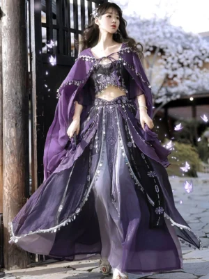 Front three quarter view of a purple Dunhuang Feitian Tang Dynasty Hanfu costume with embroidered cropped bustier, gradient chiffon skirt, silver beaded trim, and flowing cape