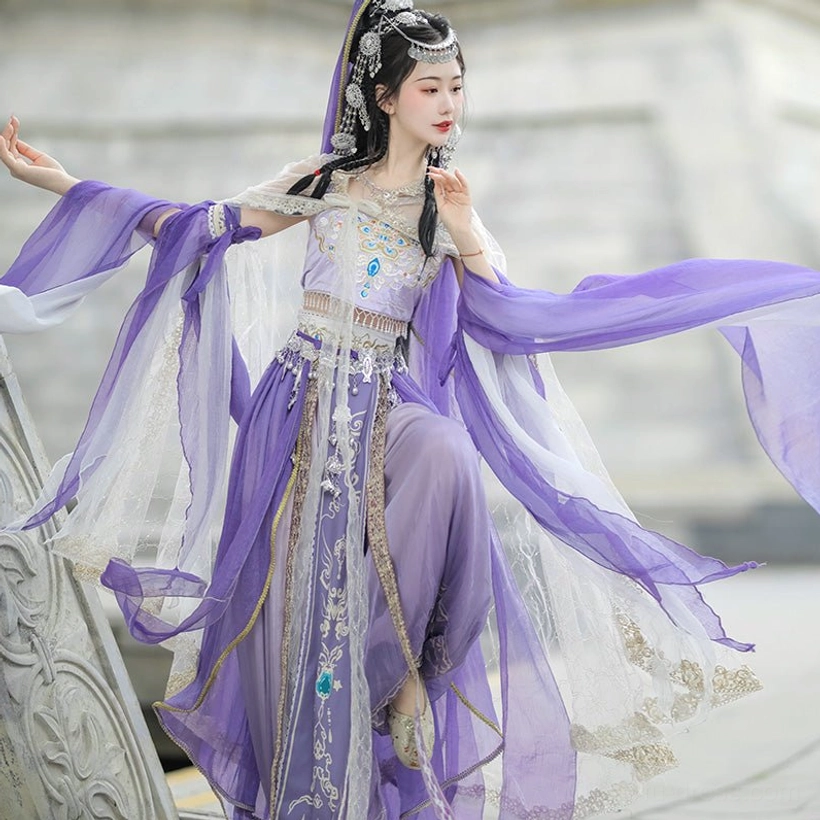 Purple Dunhuang Feitian Tang style dance costume in a dynamic pose with layered veil fabric, long ribbons, and gold trim