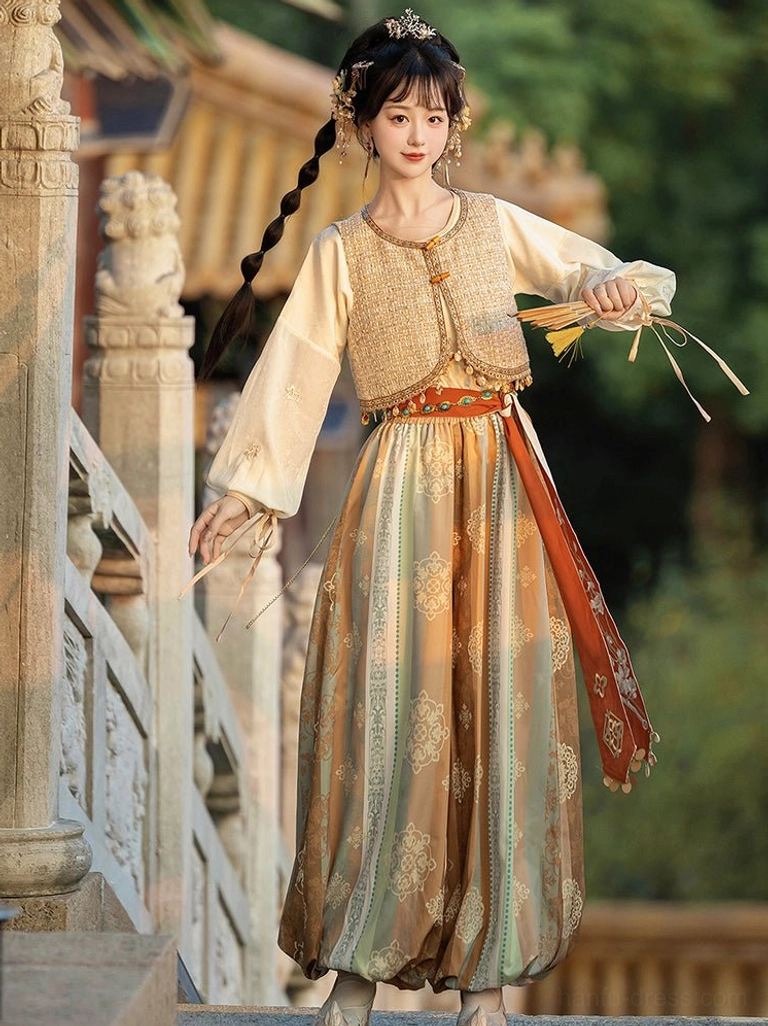 Side view of Dunhuang Feitian Tang Dynasty Hanfu set showing loose printed bloomers terracotta red sash and layered beige vest