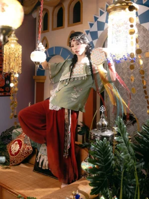 Dunhuang inspired modern Hanfu blouse with red wide-leg pants styled in a Silk Road inspired studio