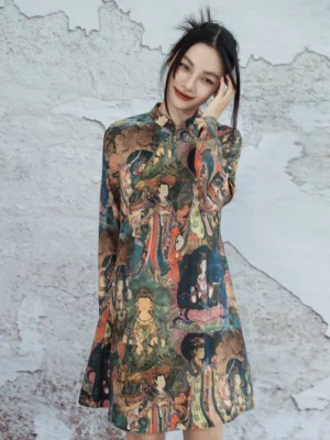 Close-up front view of the Mandarin collar and detailed ancient Chinese Dunhuang fresco print on long sleeve cheongsam dress