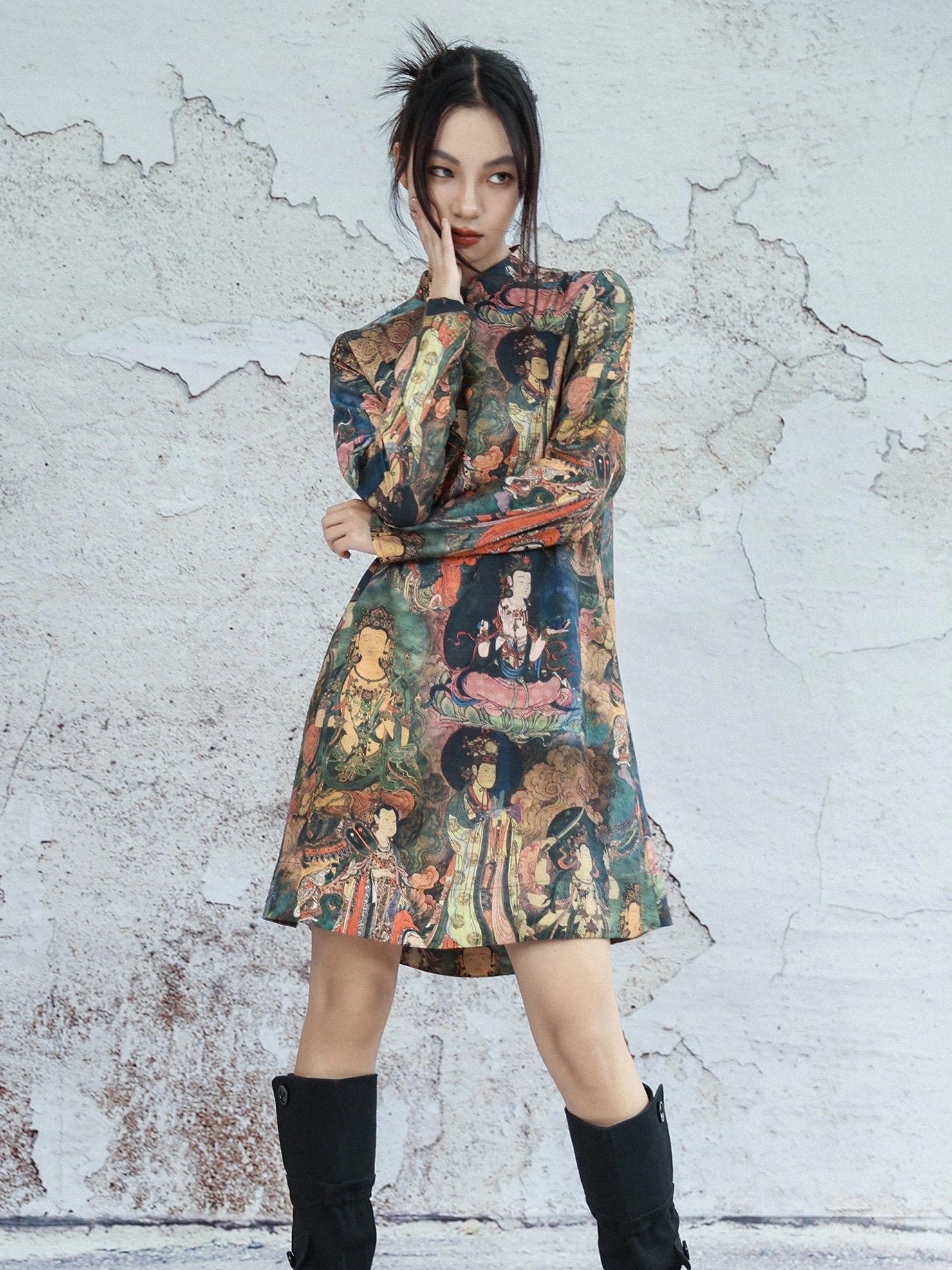 Full body three-quarter front view of Dunhuang mural print long sleeve modern Hanfu cheongsam dress with Mandarin collar and relaxed A-line silhouette