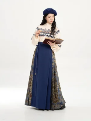 Front view of a navy blue Dunhuang-inspired mamianqun hanfu set styled with a blue beret and vintage book