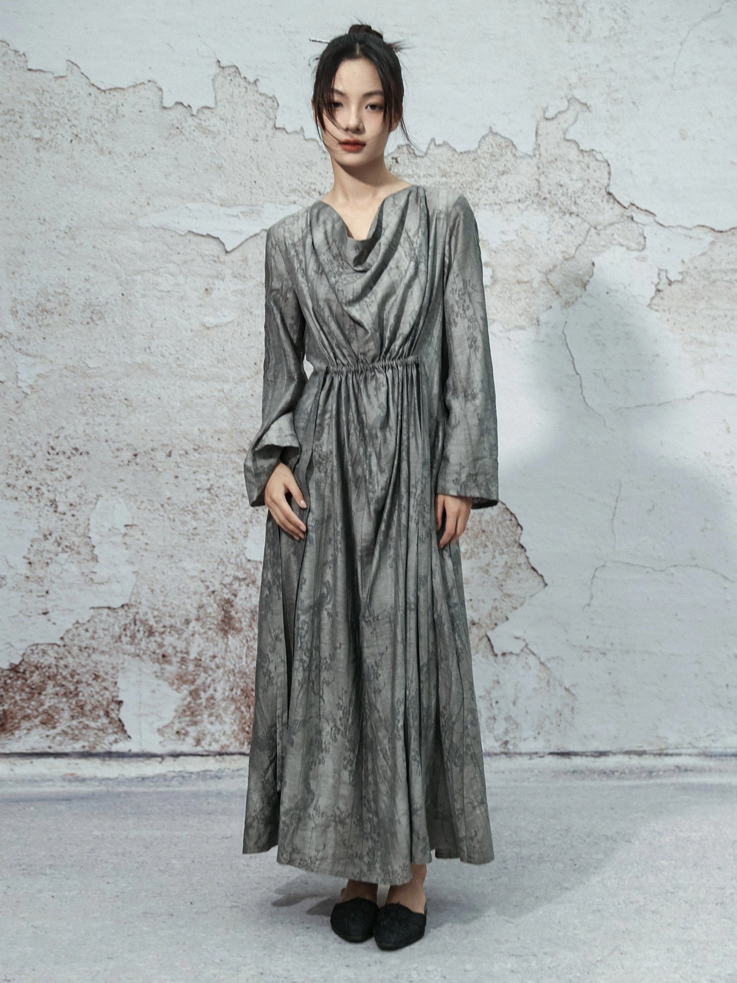 Full front view of dusty grey modern Hanfu maxi dress with marbled print, wide long sleeves, cowl collar, waist sash and floor-length skirt