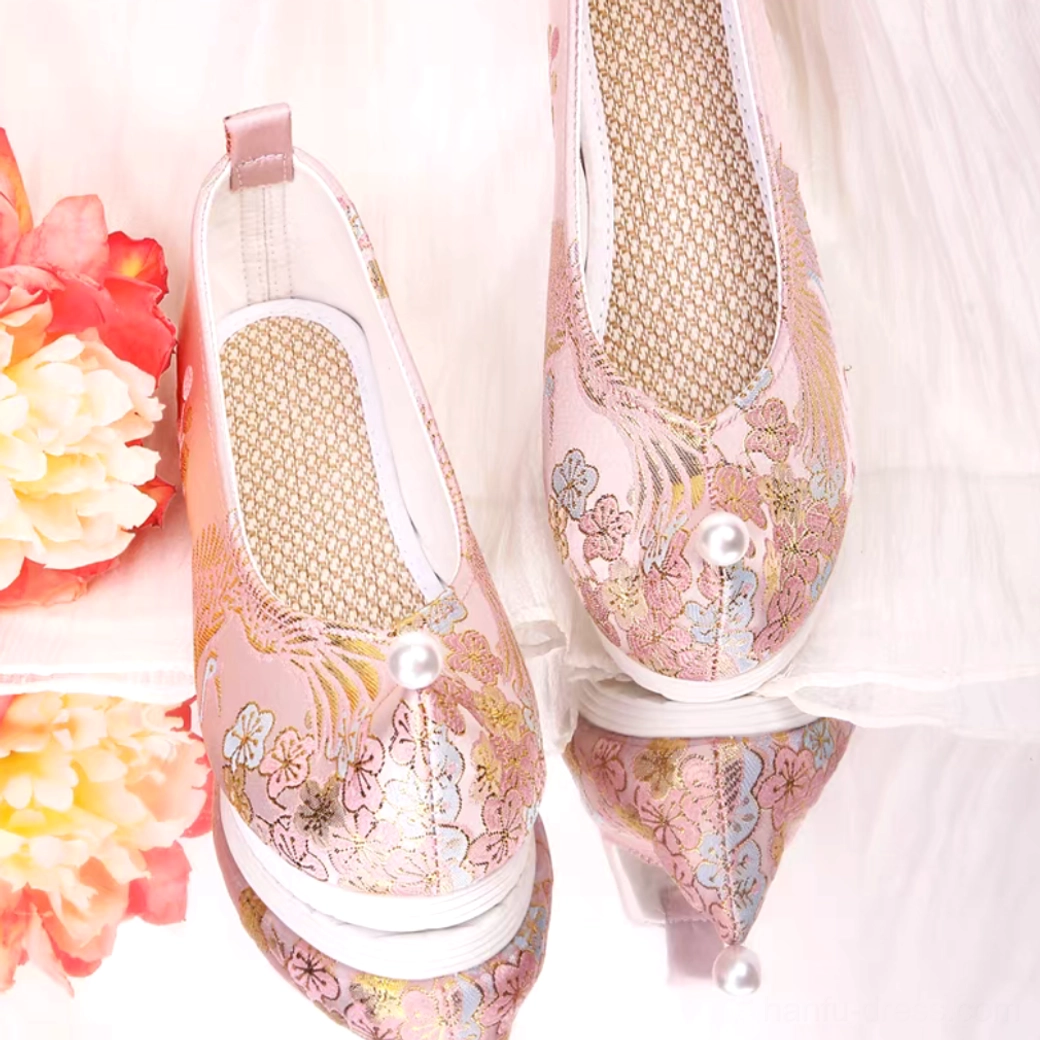 Pair of dusty pink embroidered Hanfu shoes showing the pearl toe ornament, breathable woven insole, layered white sole, and floral Chinese shoe design