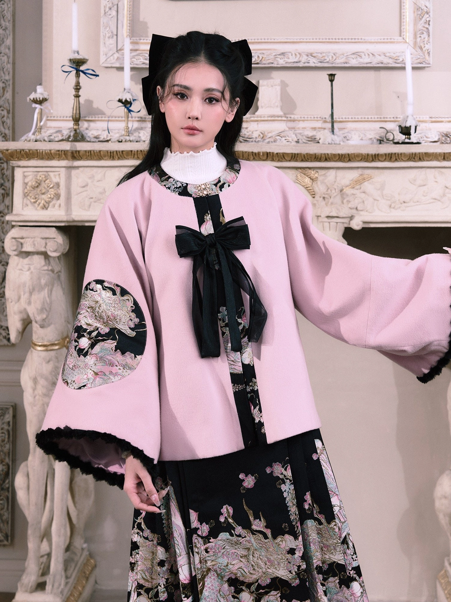 Dusty pink Ming-style Hanfu jacket with round collar black front bow wide sleeves and circular Chinese embroidery