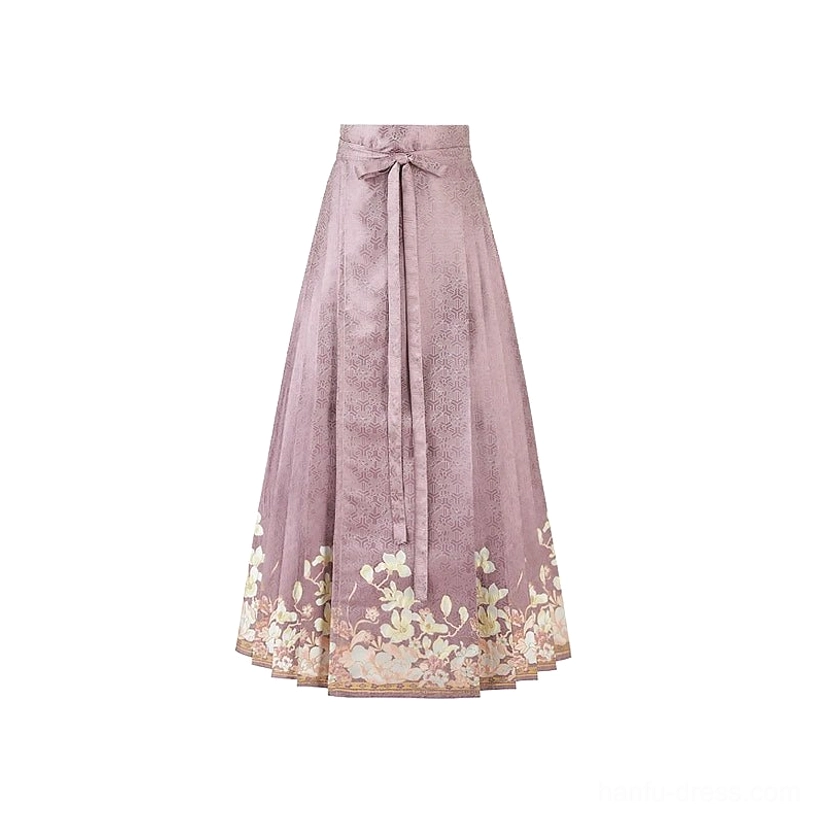 Flat lay view of a dusty purple mamianqun horse face skirt with structured pleats, tied waist sash, subtle jacquard fabric texture, and white floral prints along the hem