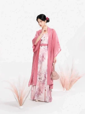 Dusty rose Song Dynasty Hanfu set with sheer beizi jacket and floral mamian style slip dress front three quarter view