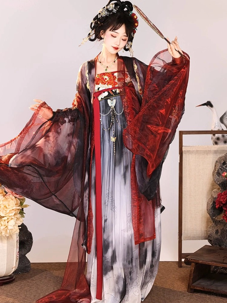 Dynamic three-quarter view of a flowing Tang Dynasty Hanfu dress with dual-tone sheer coat, ink-wash long skirt, red ribbon sash, and embroidered bust