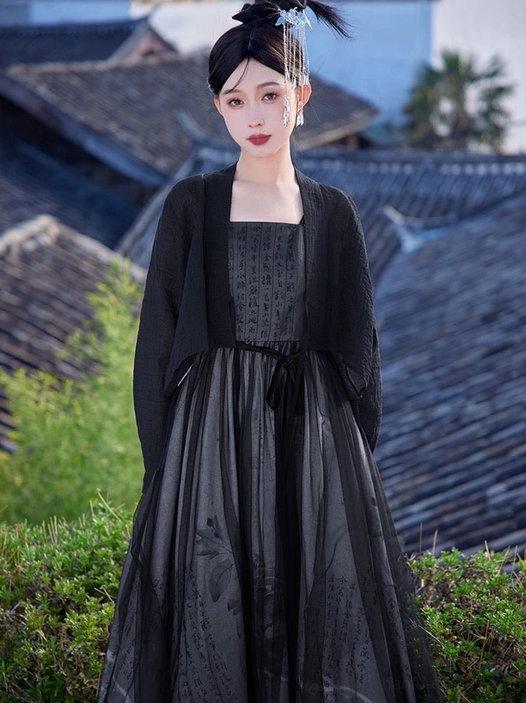 Elegant black Tang inspired Hanfu dress close up showing the textured square neck bodice sheer cardigan and flowing ink print tulle skirt