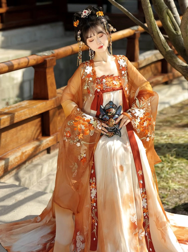 Front full-body view of an elegant Tang Dynasty Hanfu dress with embroidered bodice, ornate sleeve trims, trailing skirt hem, and traditional hair accessories