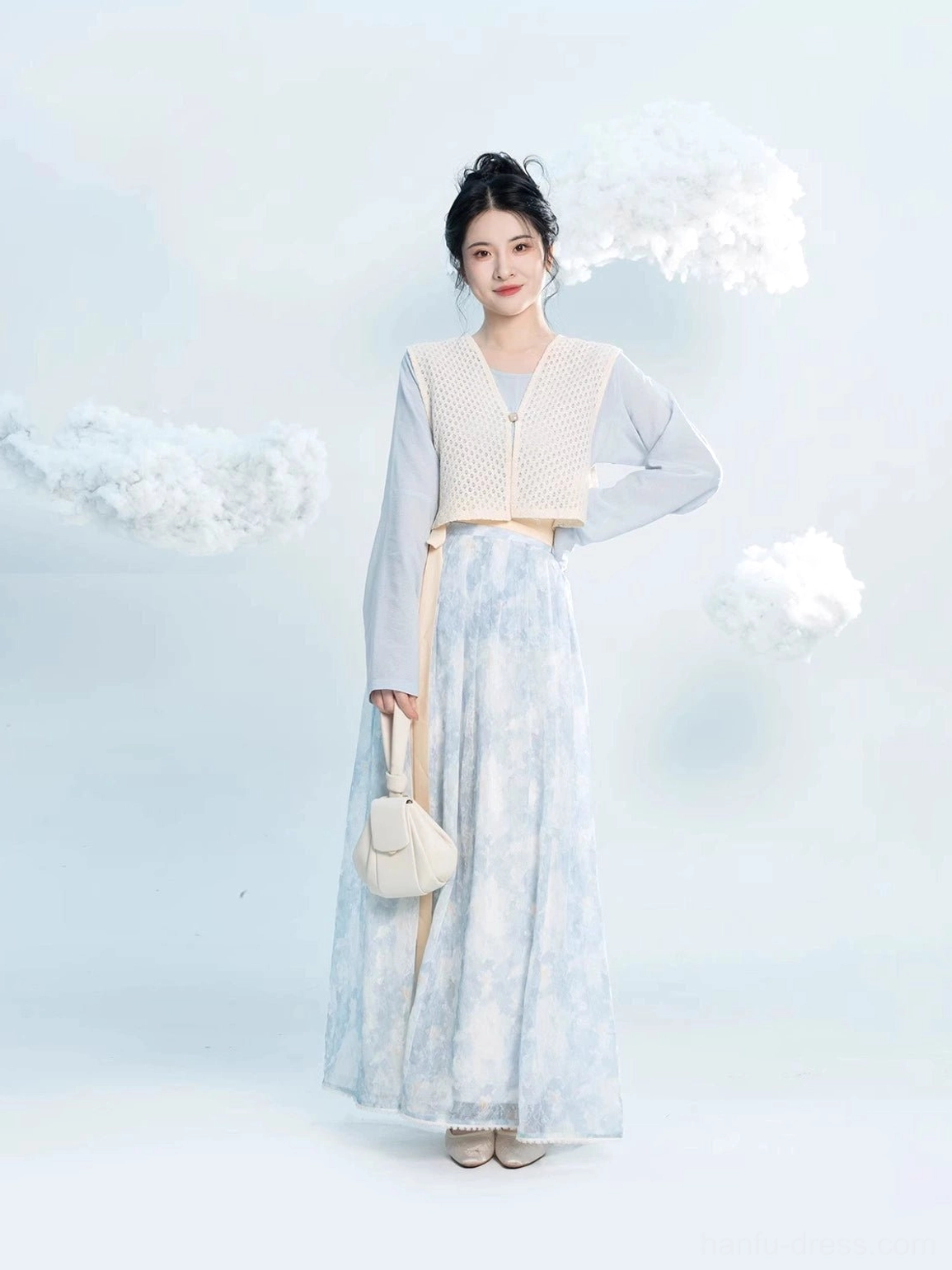 Elegant three piece Tang Dynasty Hanfu set with blue inner robe beige overlay and floral wrap skirt styled with traditional hair