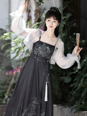 Close view of Ember Bamboo modern Tang style Hanfu featuring bamboo bodice detail sheer lantern sleeves and tassel waist ornament