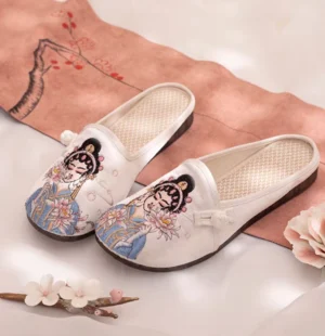Pair of white embroidered Chinese Hanfu shoes with Peking Opera beauty and lotus motifs, Chinese knot side decoration, linen insoles, and flat rubber soles