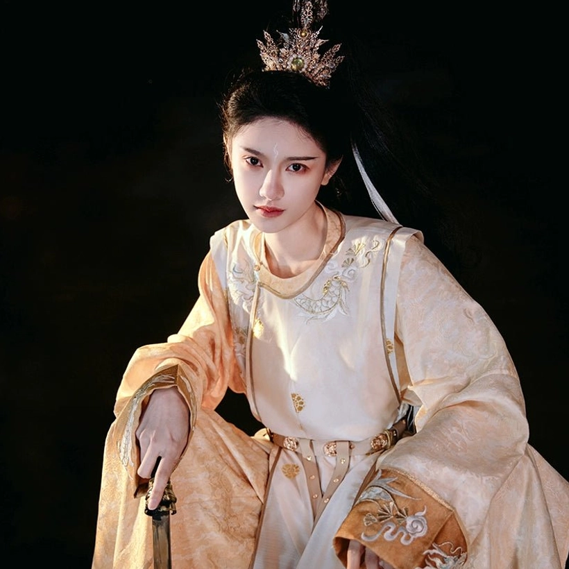 Close-up view of Eternal Dawn Tang style hanfu robe without vest, showing beige and gold jacquard fabric, floral collar embroidery, detailed cuffs, and metal belt