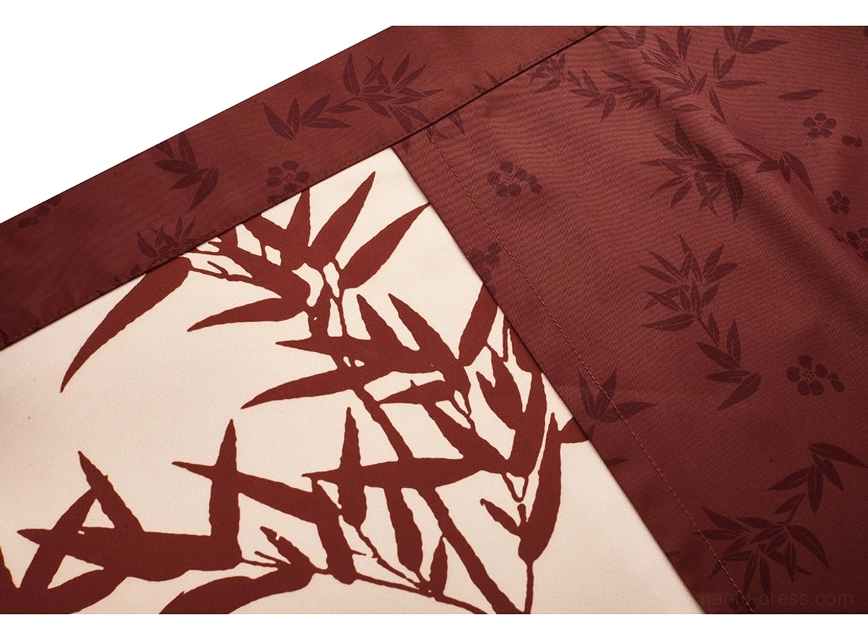Evening Magpie Hanfu wrap skirt fabric close-up with off-white bamboo print panel and dark red floral textured panel