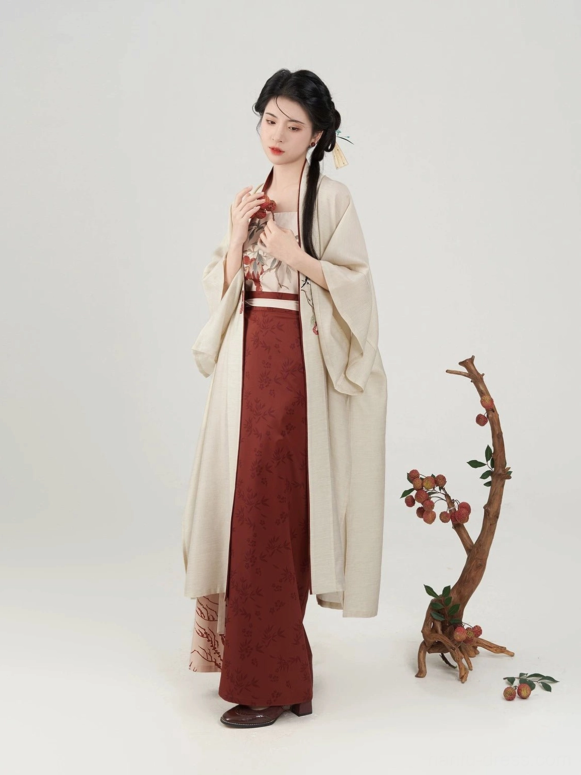 Evening Magpie modern Hanfu front styling with a plain beige wide-sleeved robe, dark red skirt, and slim waist sash