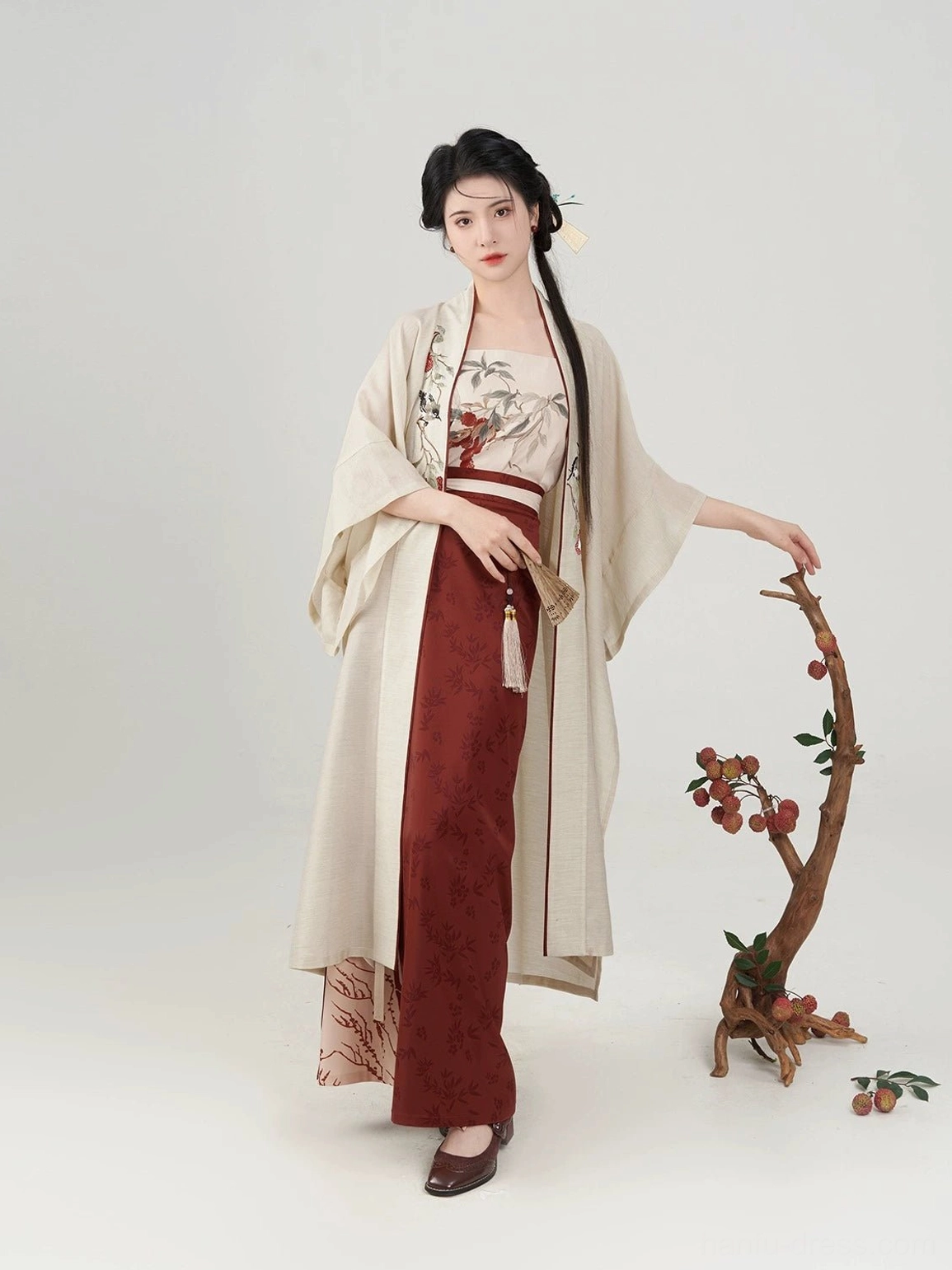 Evening Magpie Song Dynasty Hanfu full set shown from the front with a beige wide-sleeved overcoat, dark red wrap skirt, and patterned camisole