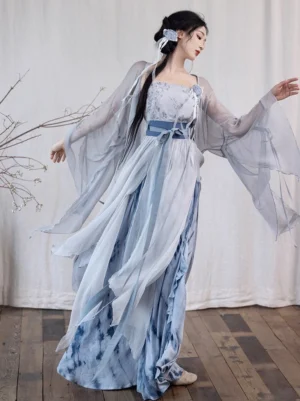 Fallen Whale modern Song Dynasty Hanfu three-quarter view showing wide sheer sleeves blue waist ties and layered skirt