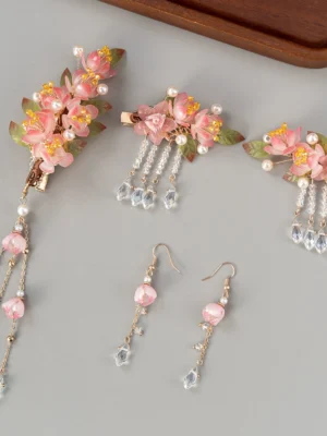 Complete pink cherry blossom Hanfu hair accessories set with flower hair clips, pearl accents, crystal tassels, pink beads, and matching dangle earrings displayed on a grey background