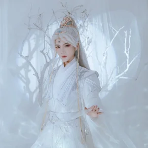 Front view of a silver-haired model wearing an ethereal blue and white Hanfu hair crown set with traditional Chinese-inspired ornaments