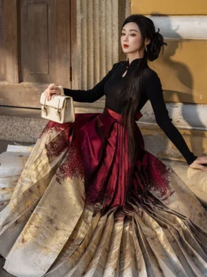 Festive Hanfu mamianqun Chinese New Year dress skirt shown in a full spread with burgundy to champagne gold gradient pleats and subtle star-like shimmer